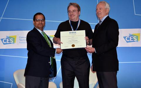 ICCE 2018 Conference Chair and EiC Consumer Electronics Magazine Saraju Mohanty, and IEEE President James A. Jefferies Conferring Ibuka Award to Linus Torvalds.
